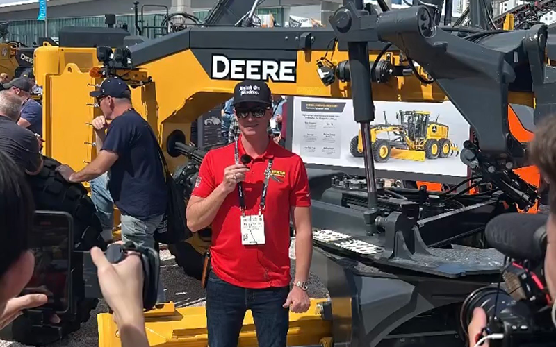 Matt Stanley speaking at John Deere booth