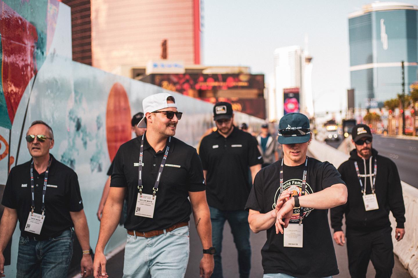 Taylor white walking with crew CONEXPO-CON/AGG 2023