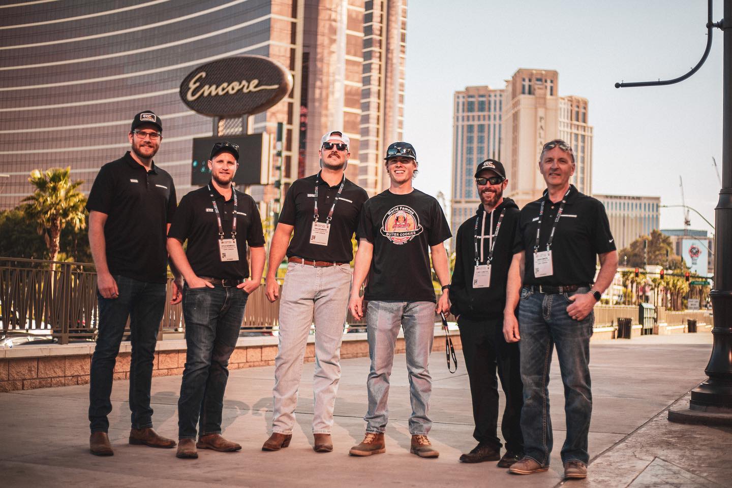 Taylor white group posing in front of the encore