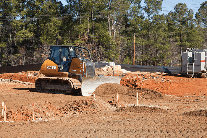 Case 1150M Dozer pushing dirt at jobsite