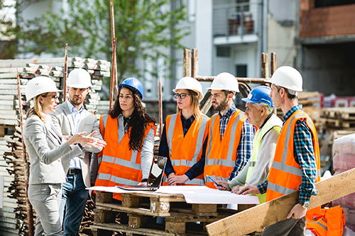 Construction team planning in a circle