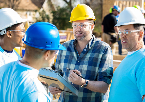 Construction crew happy working together 