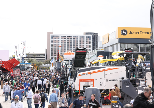 Photo of large crowd of people at CONEXPO-CON/AGG 2023, John Deere booth